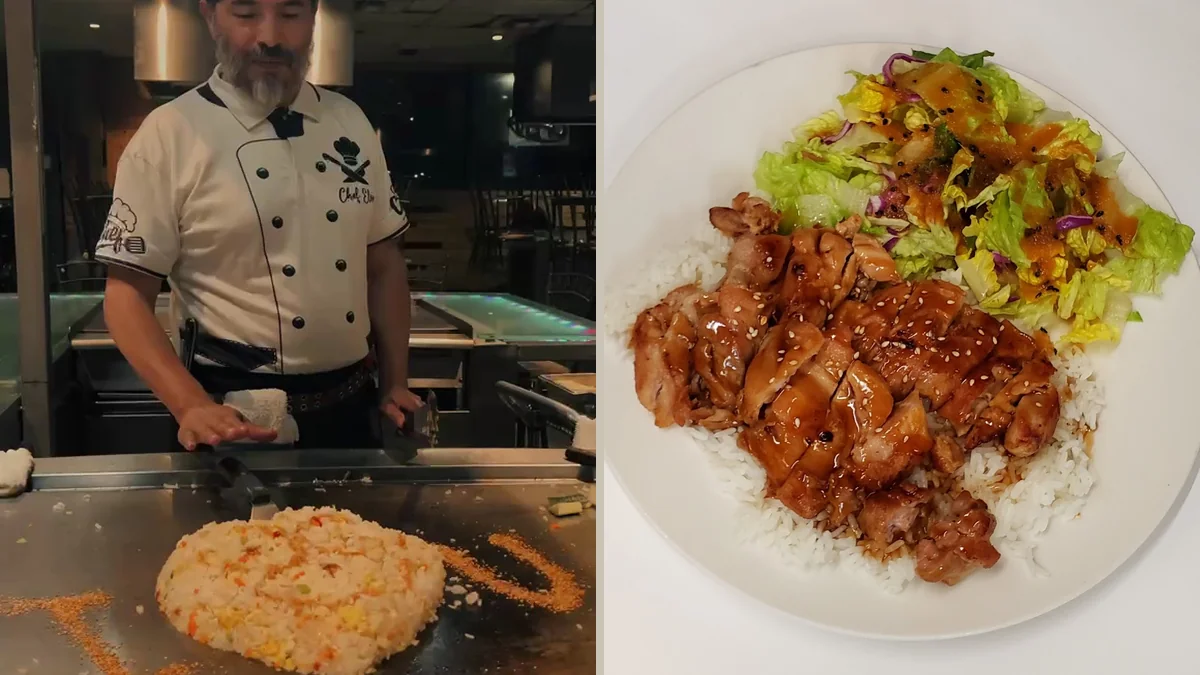 Hibachi grill with a chef cooking at the table.